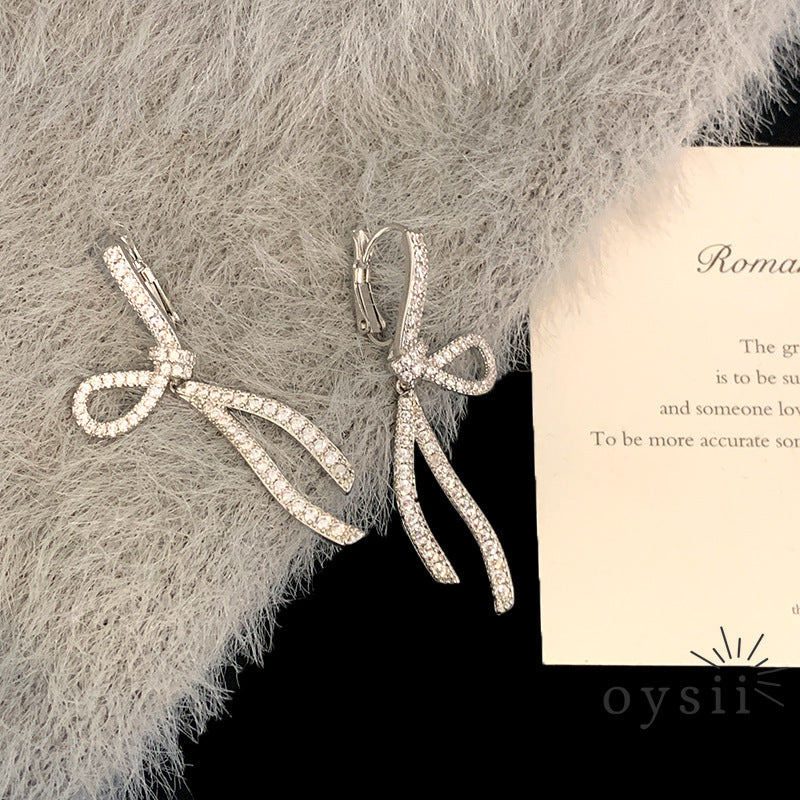 Starlit Grace – Diamond Bow Ribbon Earrings