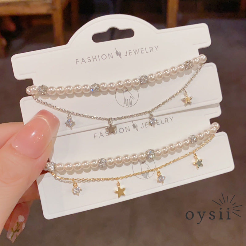 Starlit Grace — Double-Layer Pearl & Star Chain Bracelet