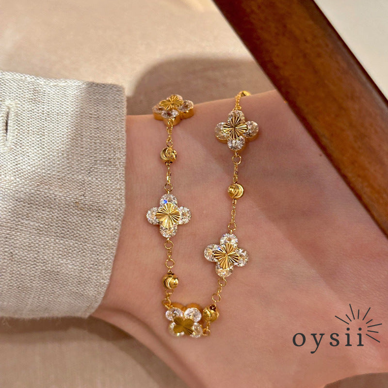 Golden Frost — Laser-Cut Four-Leaf Clover Bracelet