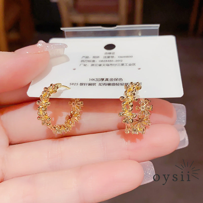 Whispering Petals — Zircon Flower Ear Cuffs