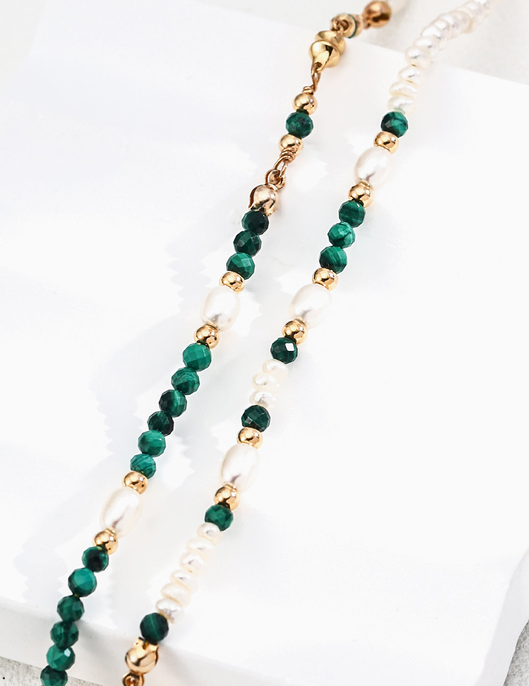 Handcrafted S925 silver necklace featuring natural freshwater pearls and malachite gemstones, designed for emotional healing, inner strength, and spiritual protection — a perfect boho-inspired jewelry piece for women seeking balance and elegance