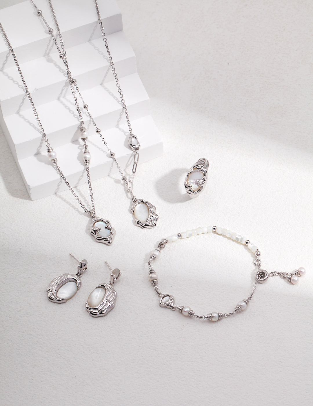 Handcrafted solid silver necklace featuring mother of pearl charm, chic fashion accessory