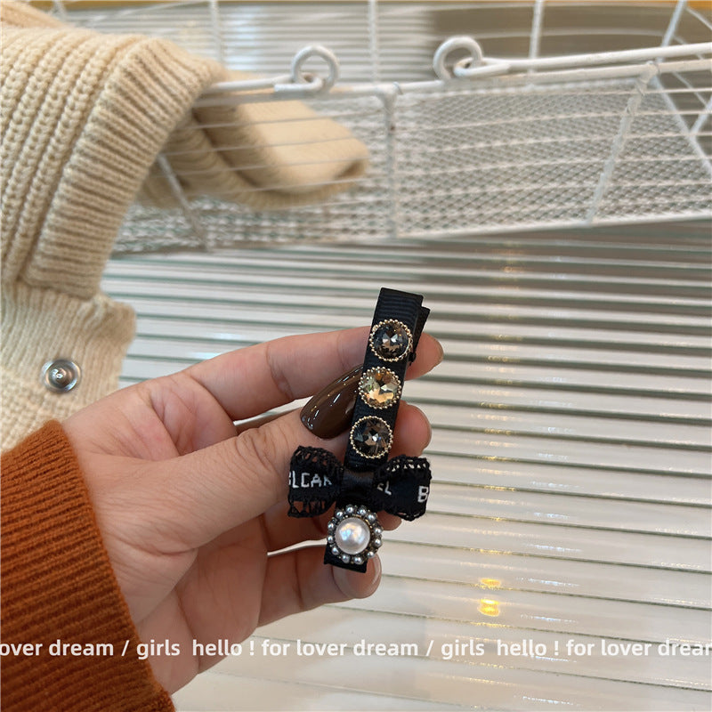 Black Camellia Pearl Bow Hair Clip