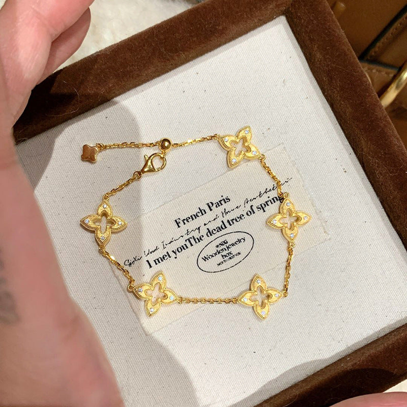 Lucky Aurora — Vintage Brushed Star & Four-Leaf Clover Bracelet