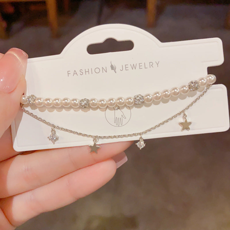 Starlit Grace — Double-Layer Pearl & Star Chain Bracelet