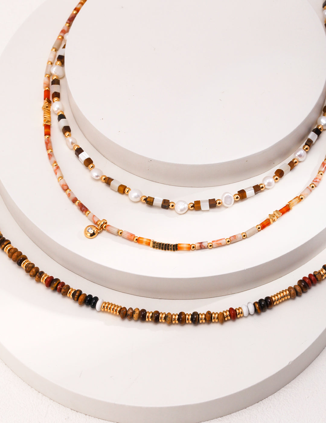 Retro style necklace featuring natural tiger eye and mother of pearl gemstones, handcrafted for grounding, protection, and emotional clarity — ideal for vintage-inspired spiritual jewelry lovers and everyday boho fashion