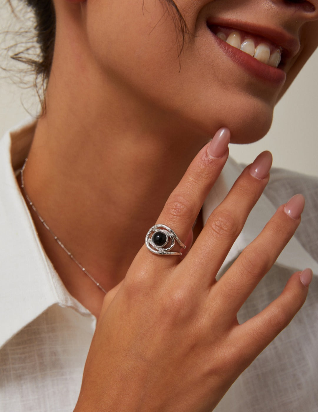 This S925 silver solitaire ring features a striking black onyx stone, offering a classic and elegant design. The solitaire setting highlights the beauty of the black onyx, making it a versatile piece that pairs perfectly with any outfit. Ideal for both casual and formal occasions, this ring is perfect for those who appreciate timeless sophistication and high-quality craftsmanship.