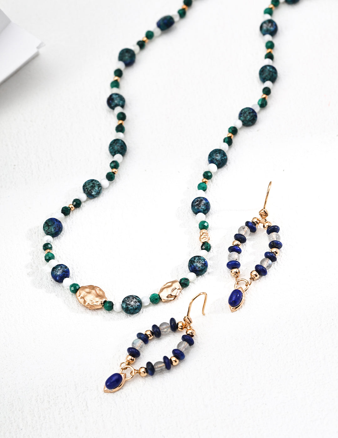 These S925 silver earrings feature a beautiful combination of grey moonstone and lapis lazuli, creating a refined, timeless design. The soft, iridescent glow of the moonstone contrasts beautifully with the deep blue of the lapis lazuli, making these earrings an ideal accessory for both everyday elegance and formal occasions.