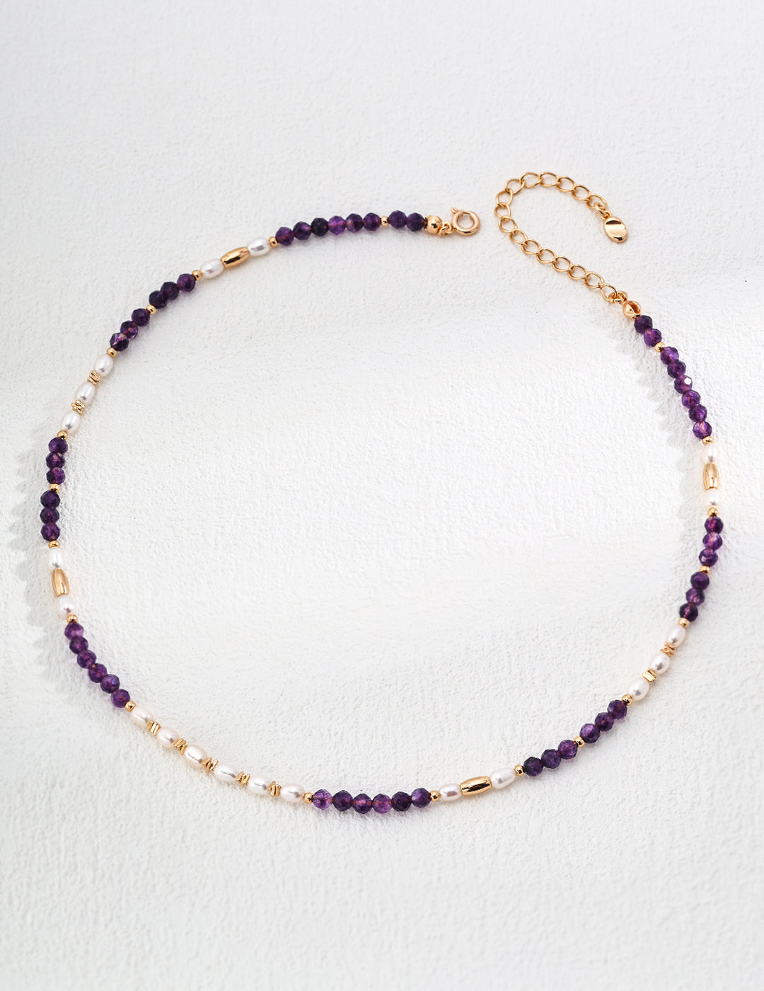 This S925 silver necklace features a beautiful combination of natural pearls and amethyst, creating a vintage-inspired and elegant design. The lustrous natural pearls are perfectly complemented by the rich purple hue of amethyst, making this necklace ideal for both casual and formal occasions. Perfect for those who appreciate high-quality, handcrafted jewelry with timeless beauty and sophistication.