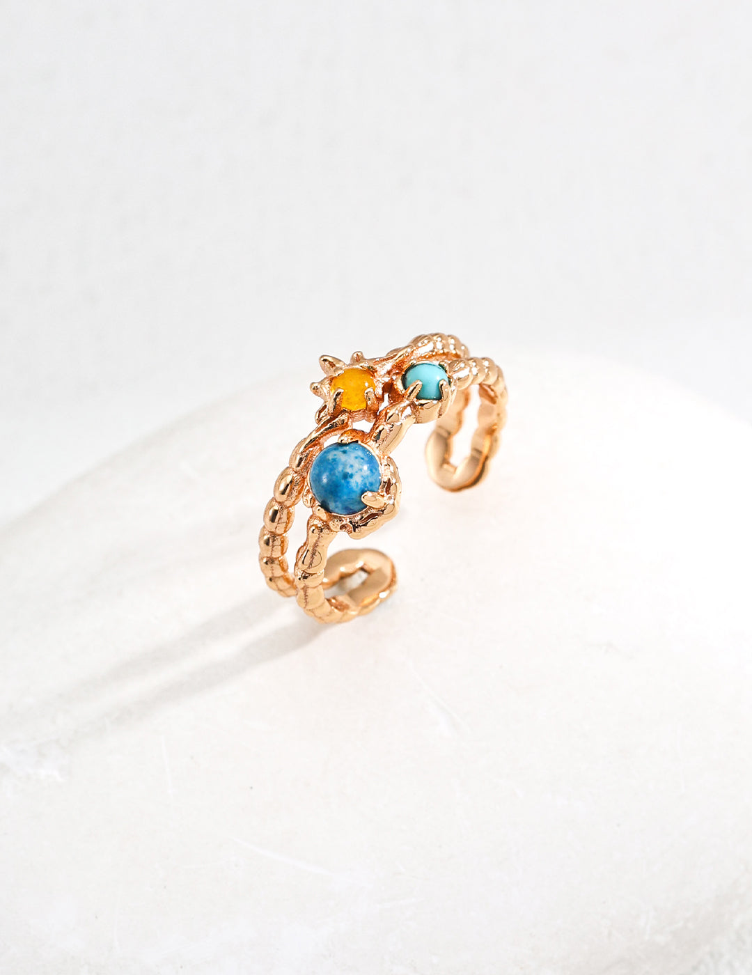 This S925 silver vintage ring features a beautiful blend of synthetic turquoise, yellow chalcedony, and apatite, offering a vibrant and elegant design. The combination of these unique gemstones in a vintage-inspired setting creates a timeless piece, perfect for adding a touch of sophistication to any outfit. Ideal for those who appreciate high-quality, handcrafted jewelry with a distinctive and colorful appeal.