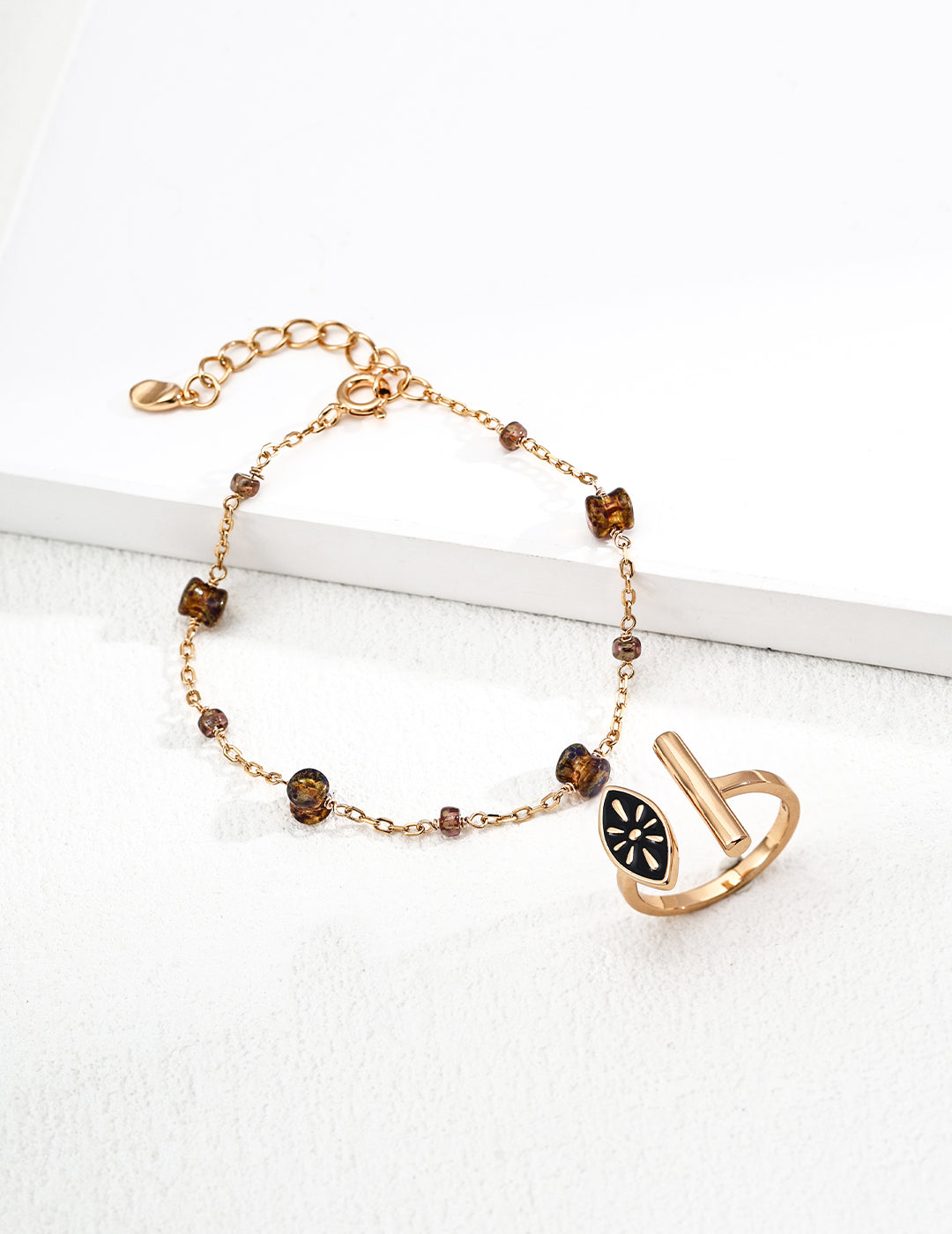This simple S925 silver bracelet features smooth glass beads in a clean, understated design. Its minimalist style makes it perfect for layering or wearing alone, offering a delicate and modern touch for casual and elegant looks alike.