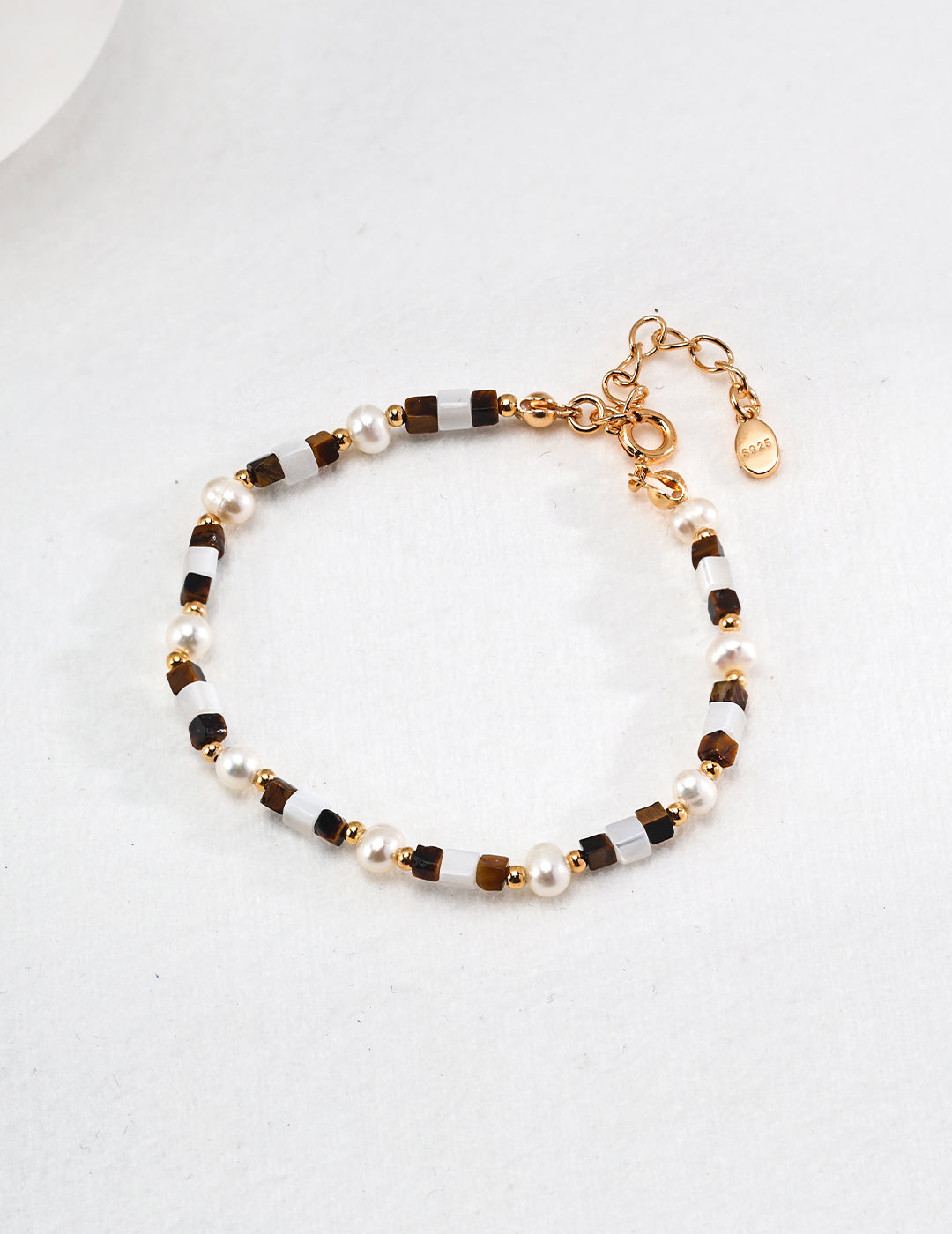 Sterling silver bracelet featuring natural tiger eye gemstones, handcrafted to promote strength, grounding, and protection — a timeless piece for spiritual healing, boho fashion, and everyday confidence
