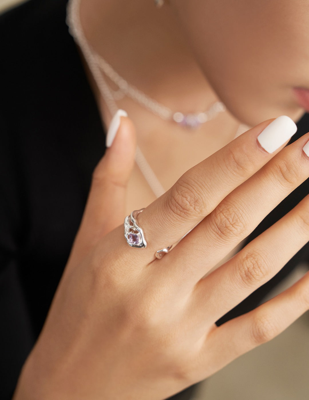 This sterling silver ring features a stunning violet crystal, offering a radiant and elegant design. The rich violet color of the crystal beautifully contrasts with the sleek sterling silver band, making this ring the perfect accessory for both casual and formal occasions. Ideal for those who appreciate sparkling, high-quality jewelry with a touch of sophistication.