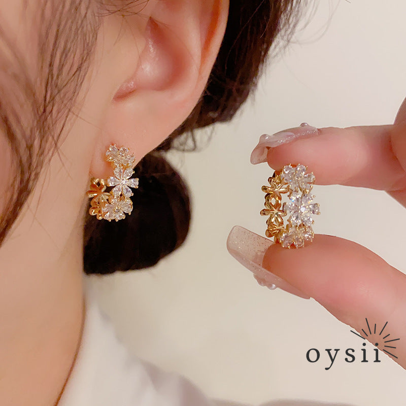 Whispering Petals — Zircon Flower Ear Cuffs