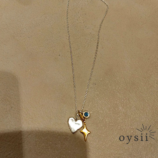 Stellar Heart – Gold Starburst Pendant Necklace