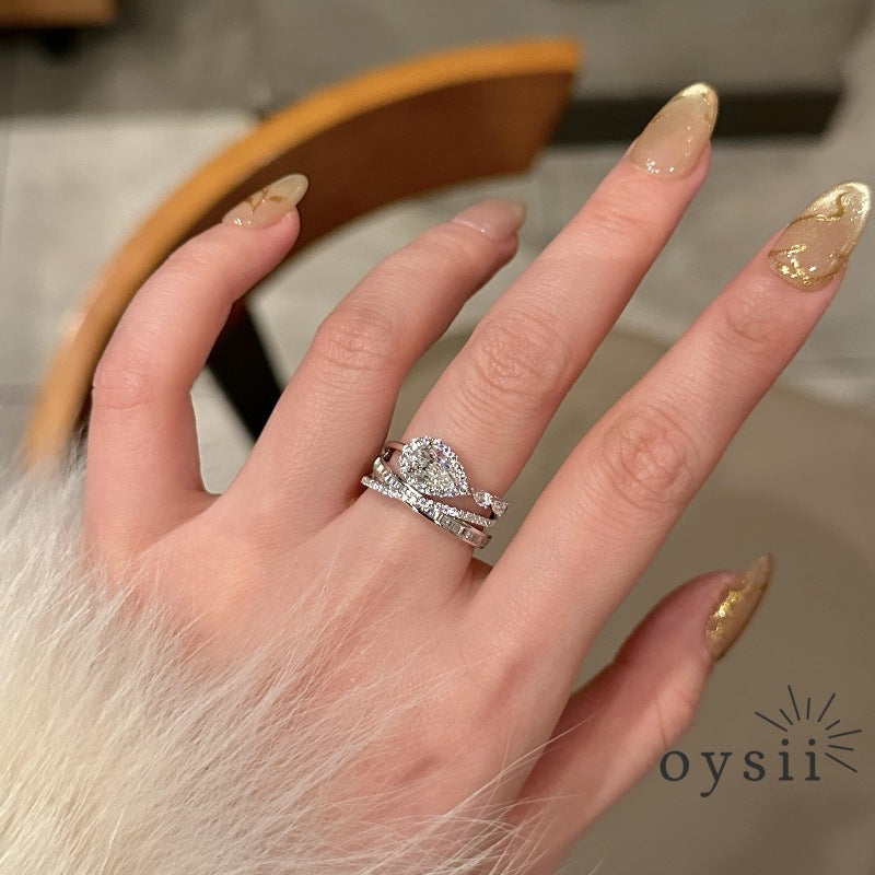 Luminous Drift — Multi-Layer Diamond Drop Ring