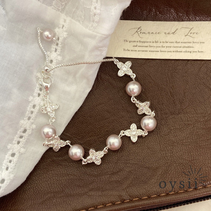 Starlight Clover – Manta Pearl & Pavé Four-Leaf Flower Bracelet
