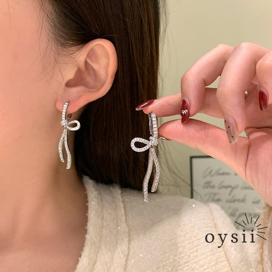Starlit Grace – Diamond Bow Ribbon Earrings