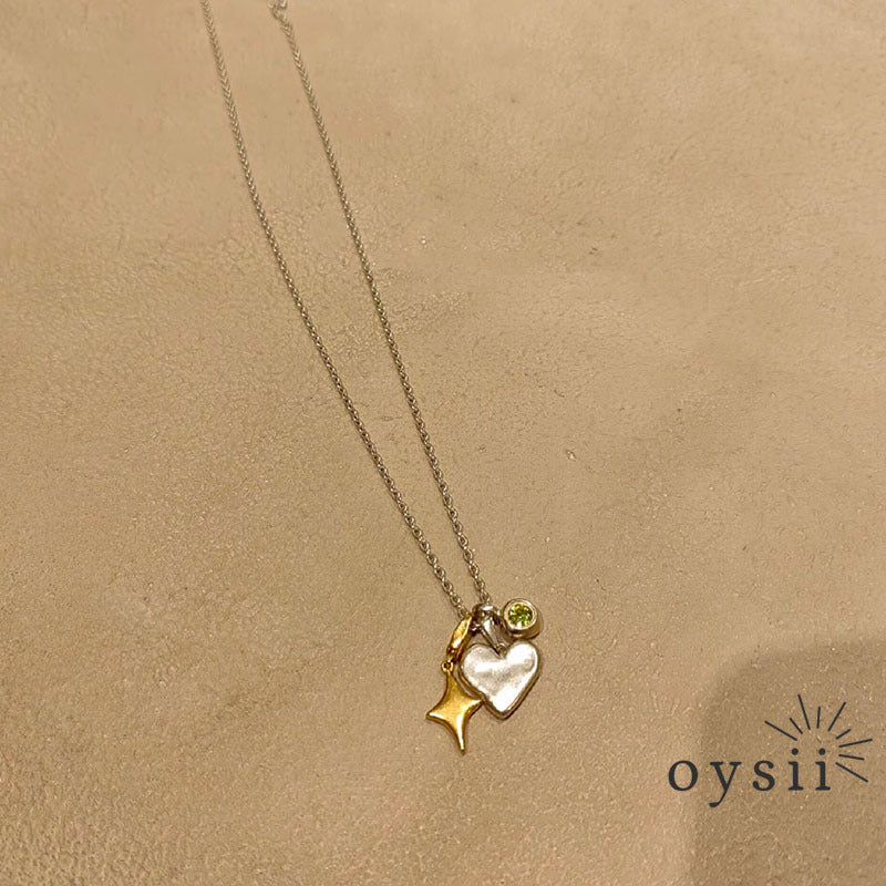 Stellar Heart – Gold Starburst Pendant Necklace
