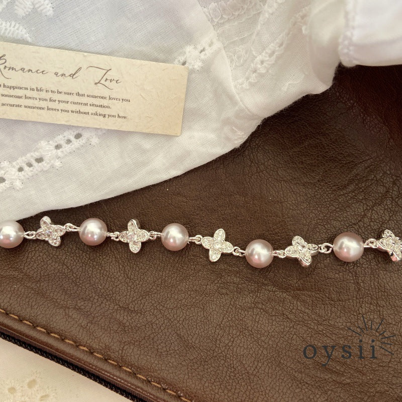 Starlight Clover – Manta Pearl & Pavé Four-Leaf Flower Bracelet