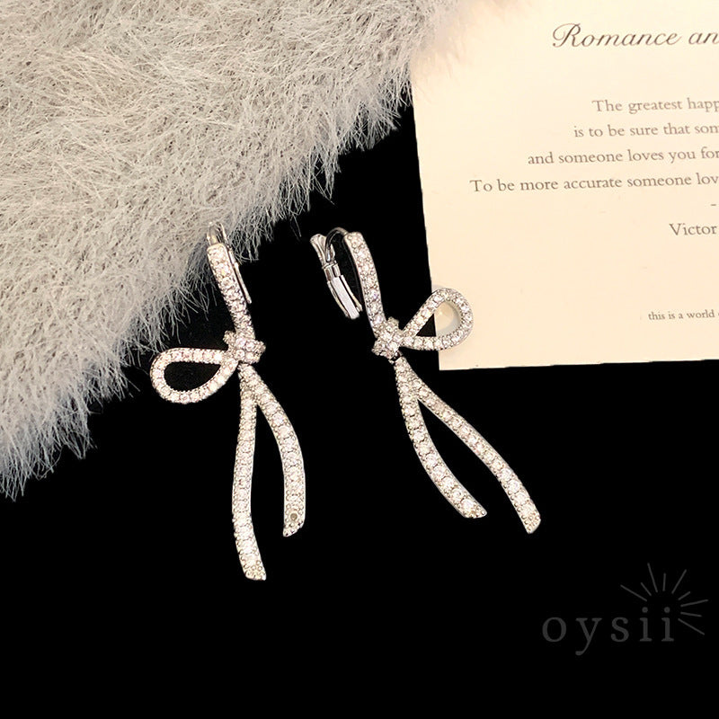 Starlit Grace – Diamond Bow Ribbon Earrings