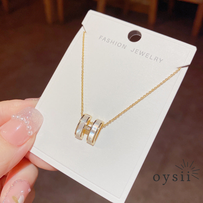 Hermes Whisper — Mother-of-Pearl Initial Stud Earrings