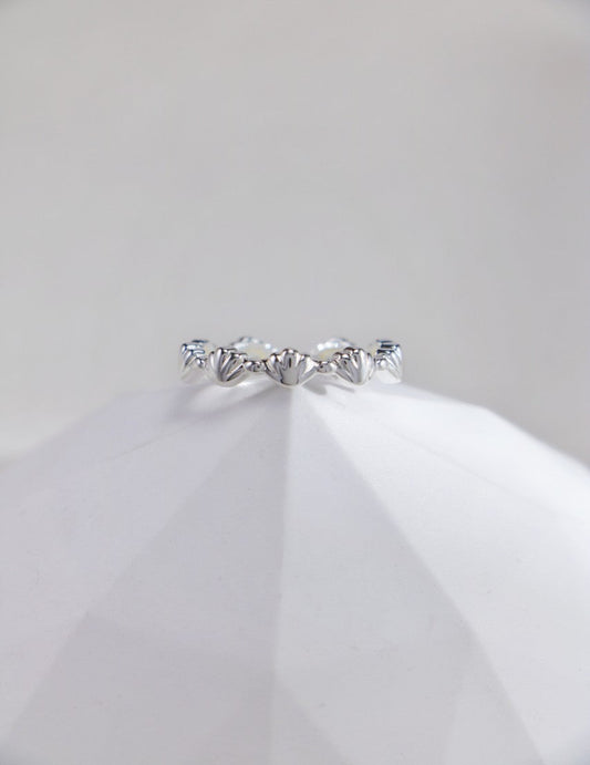 Elegant sterling silver seashell-inspired band, timeless nautical fashion piece