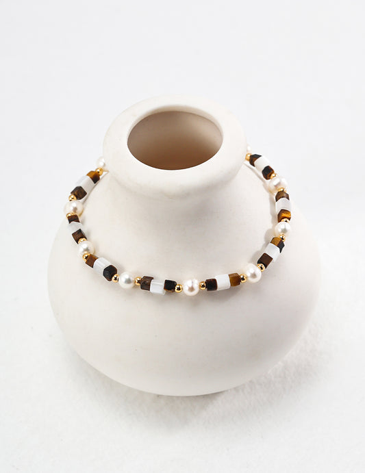Handcrafted silver bracelet featuring a natural tiger eye gemstone, known for grounding energy, protection, and confidence — perfect for spiritual jewelry lovers, boho fashion enthusiasts, and meaningful everyday wear