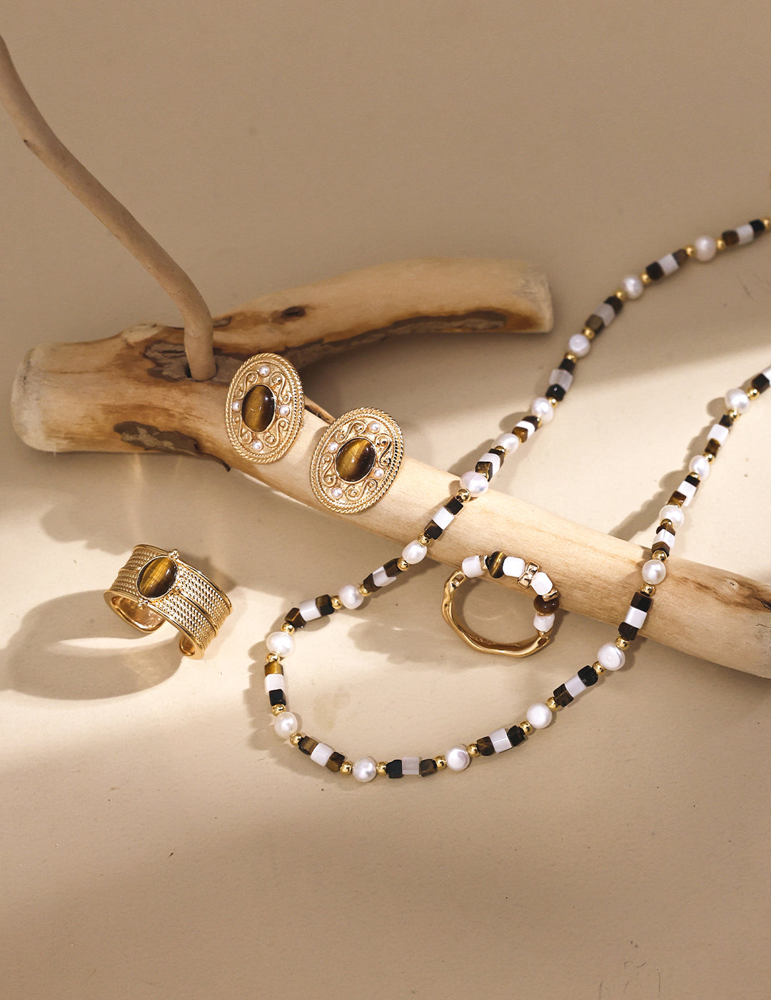 Handcrafted vintage necklace with natural tiger eye and mother of pearl gemstones, offering grounding energy, intuition, and emotional balance — perfect for spiritual jewelry collectors, bohemian fashion lovers, and meaningful gift ideas
