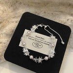 Rosette Charm – Manta Pearl & Zircon Four-Leaf Flower Bracelet