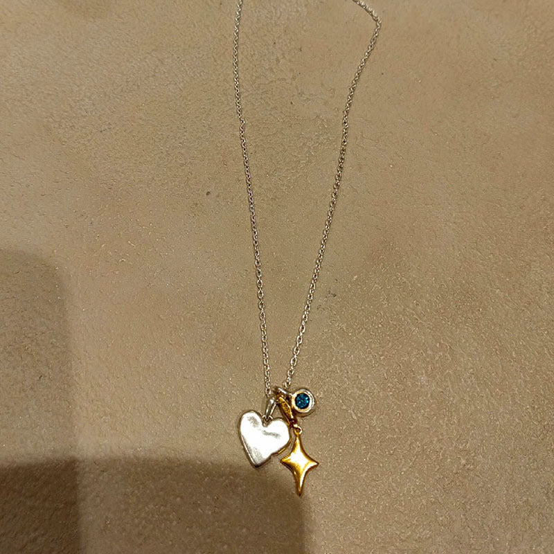 Stellar Heart – Gold Starburst Pendant Necklace