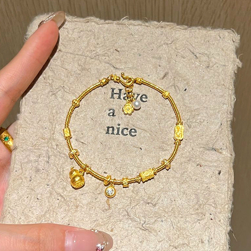 Gourd Harmony – Braided Tassel Pearl Bracelet