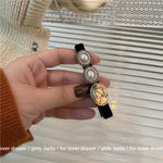 Black Camellia Pearl Bow Hair Clip