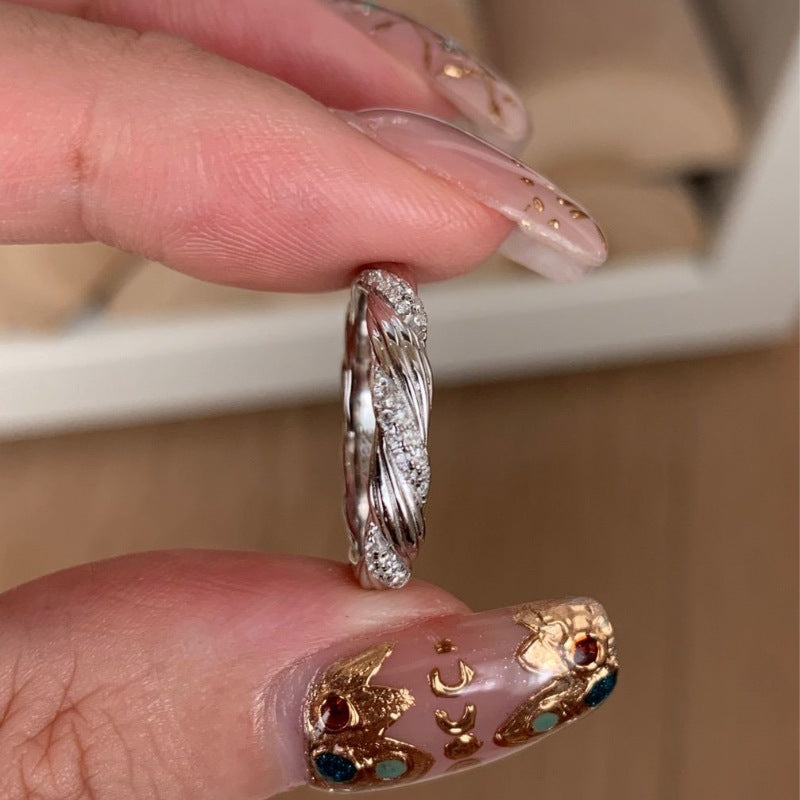 Twist Elegance — Vintage Braided Diamond Ring