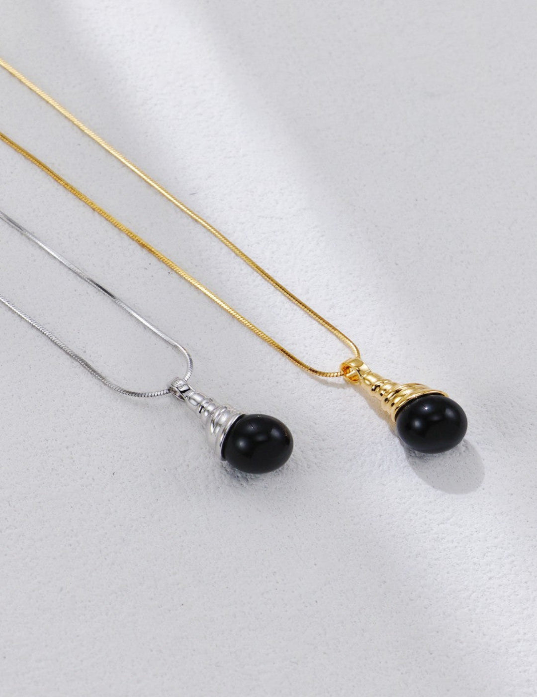 This S925 silver necklace features a sleek black onyx pendant, combining timeless elegance with modern simplicity. Perfect for everyday wear or layering, it's a versatile accessory for those who love classic gemstone jewelry with a bold edge.