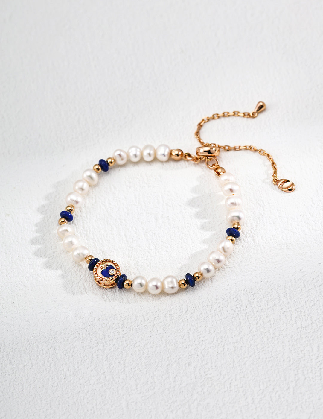 Vintage-style S925 silver bracelet featuring natural pearls and deep blue lapis lazuli gemstones, perfect for elegant boho and zodiac-inspired jewelry collections