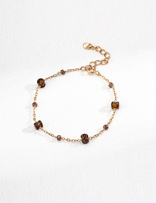 This bracelet features delicate glass beads strung on S925 sterling silver, offering a clean, minimalist look. Lightweight and refined, it’s perfect for layering or wearing alone as a subtle statement piece. Ideal for daily wear and thoughtful gifting.