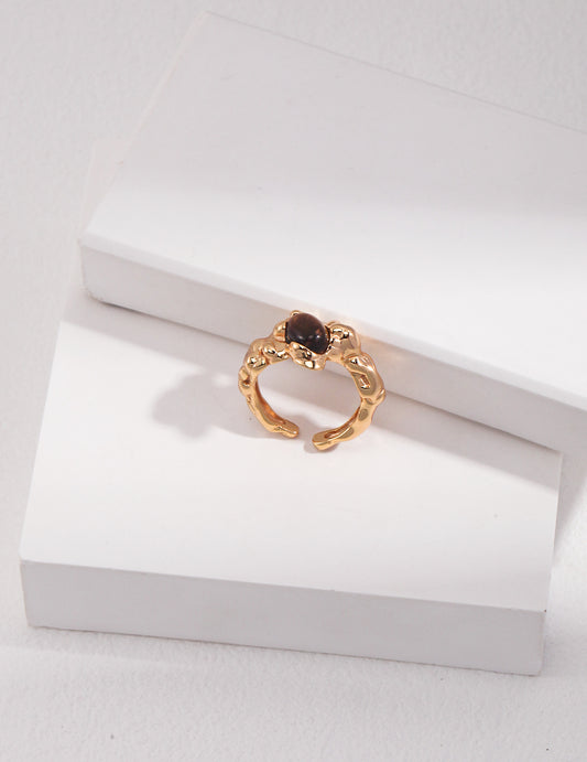 Handcrafted sterling silver tiger eye ring for men and women, featuring a natural polished gemstone believed to attract wealth and offer grounding energy — perfect for spiritual jewelry lovers or as a unique boho statement ring