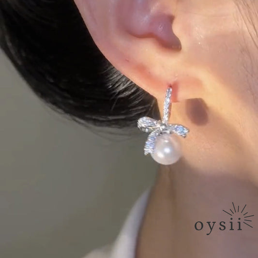 Parisian Grace – Asymmetric Pearl Bow Earrings
