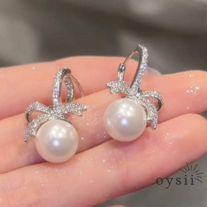 Parisian Grace – Asymmetric Pearl Bow Earrings