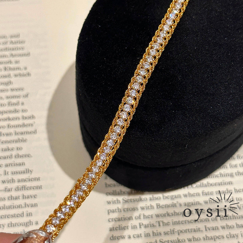 Twist Elegance – Pavé Braided Bracelet