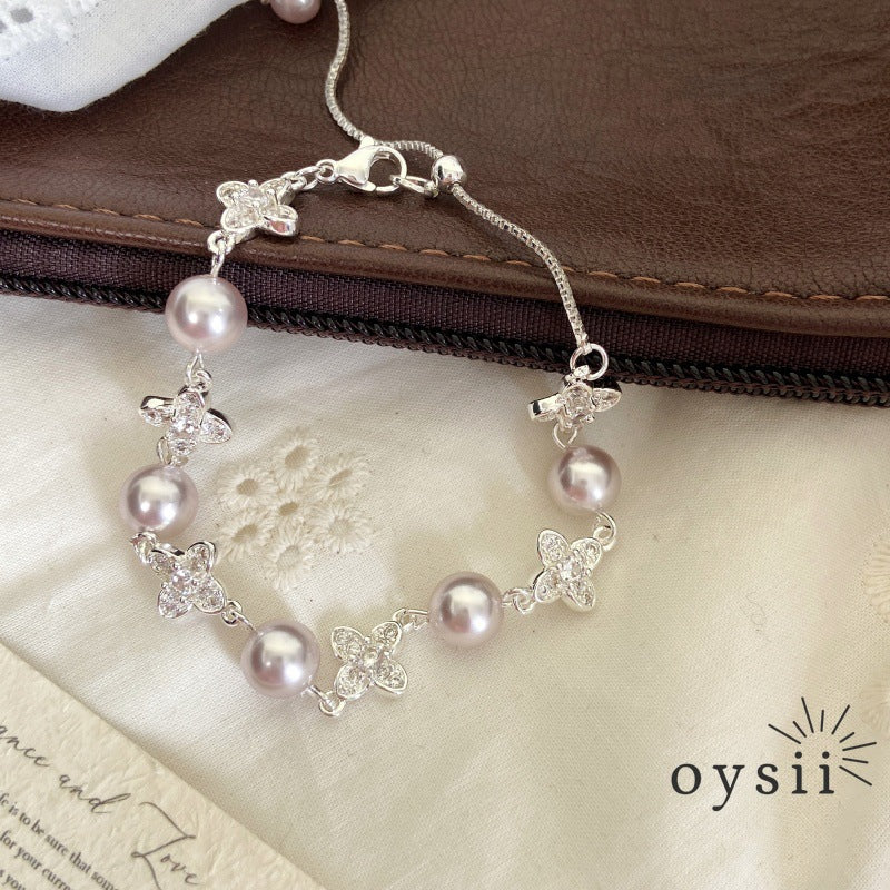 Starlight Clover – Manta Pearl & Pavé Four-Leaf Flower Bracelet