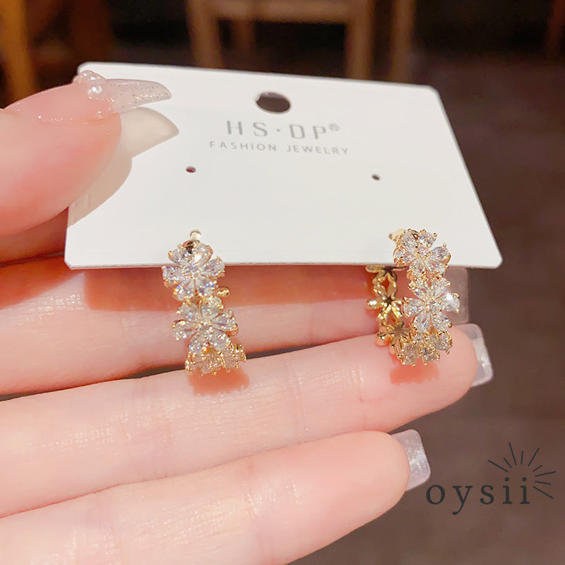 Whispering Petals — Zircon Flower Ear Cuffs