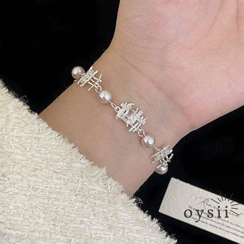 Rosette Charm – Manta Pearl & Zircon Four-Leaf Flower Bracelet