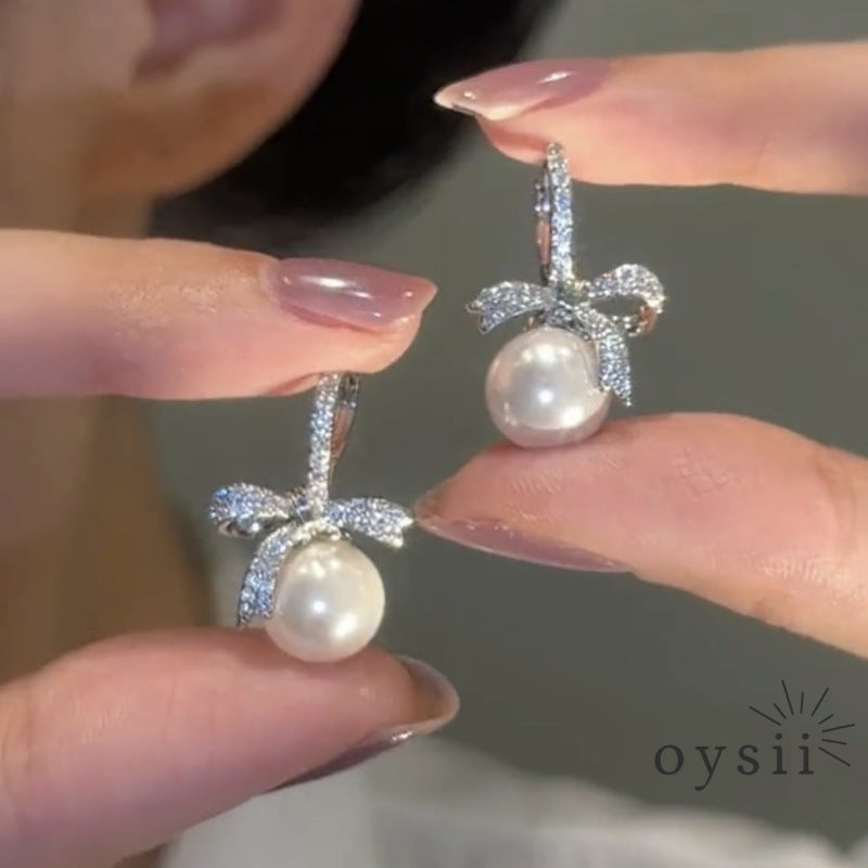 Parisian Grace – Asymmetric Pearl Bow Earrings